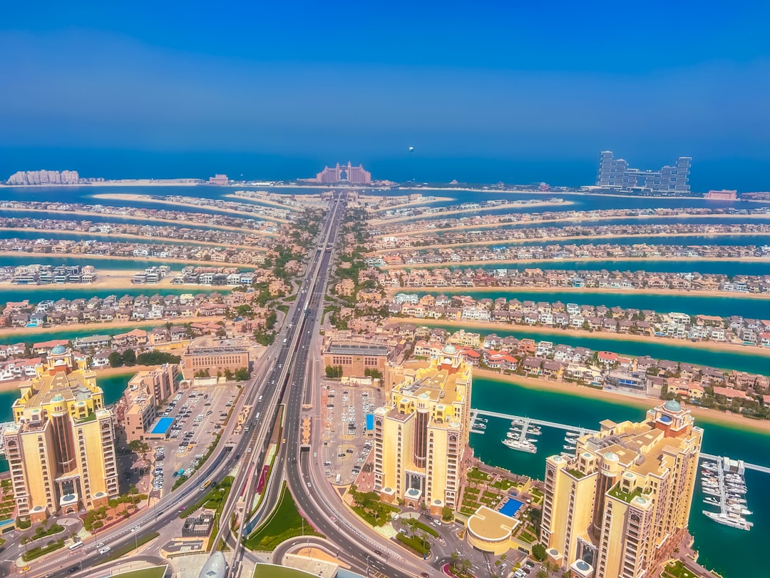 Aerial view of Palm Jumeirah with turquoise water and luxury villas